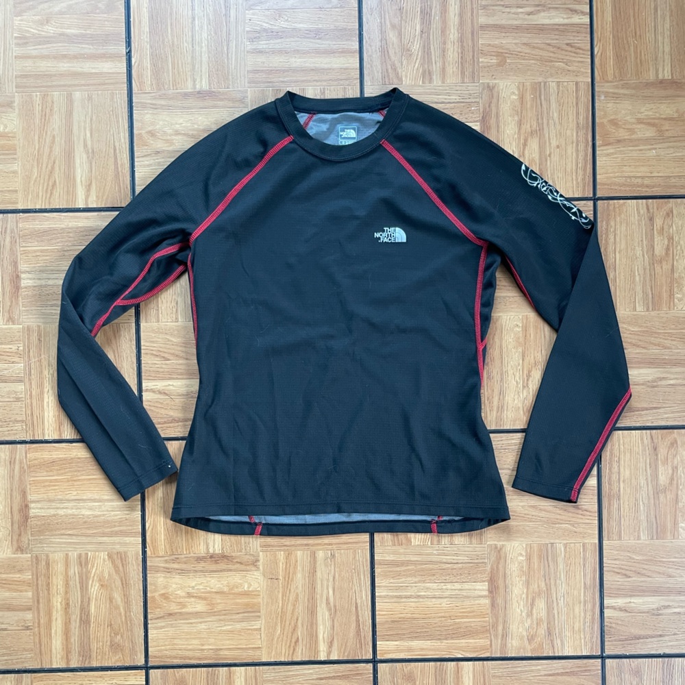 The North Face long-sleeve activewear crew-neck.
